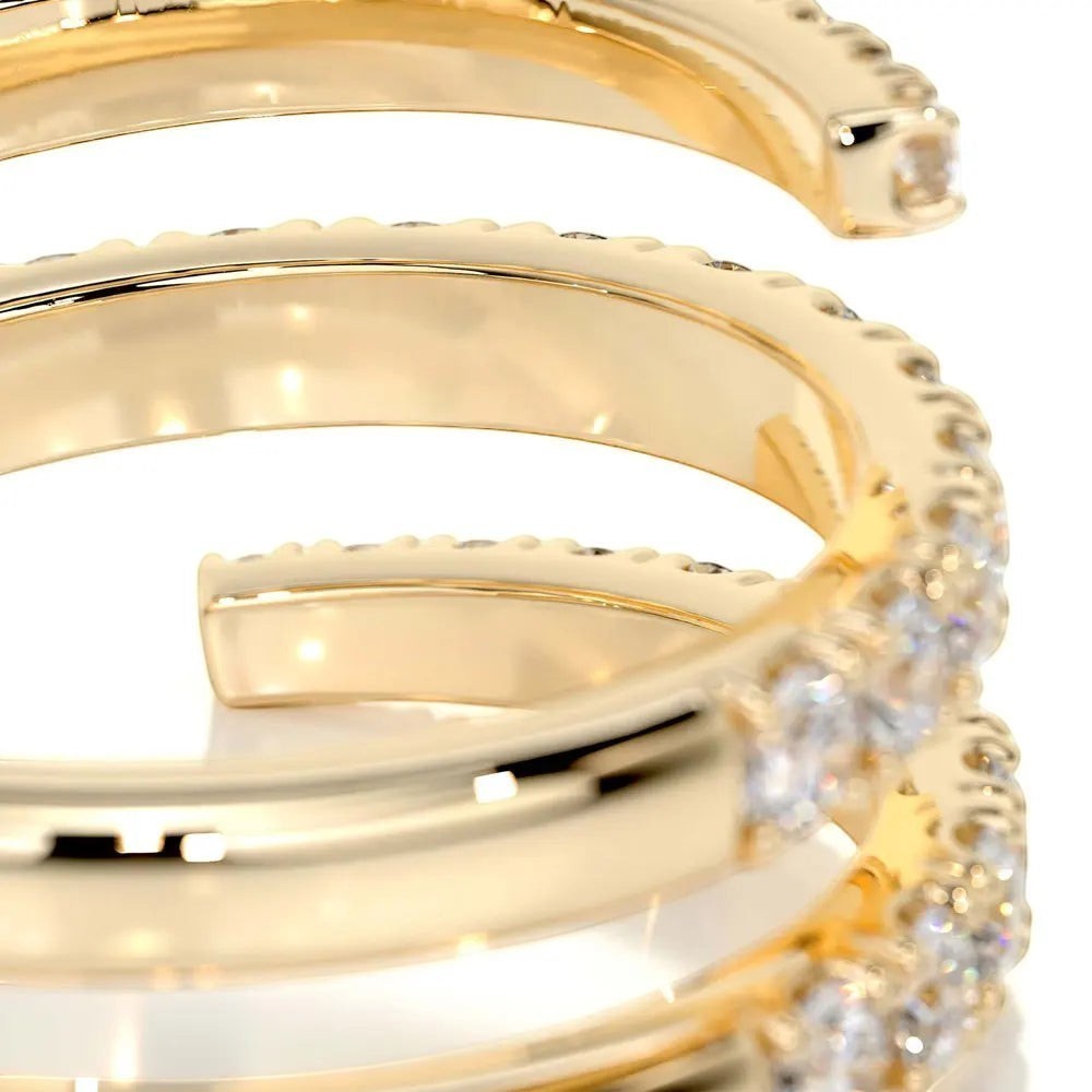 Bee-Bee's yellow gold plated sterling silver spiral eternity band with D VVS1 moissanite stones.