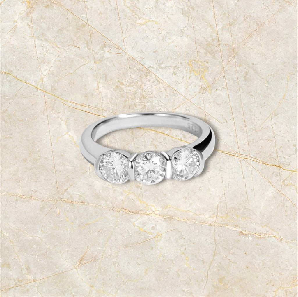 Bee-Bees sterling silver ring with three round moissanite stones, 18k white gold plated, GRA certified.