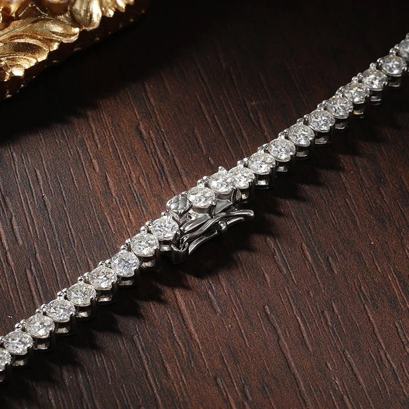 Bee-Bee's 18k white gold plated silver triple-claw moissanite tennis necklace with round cut stones.