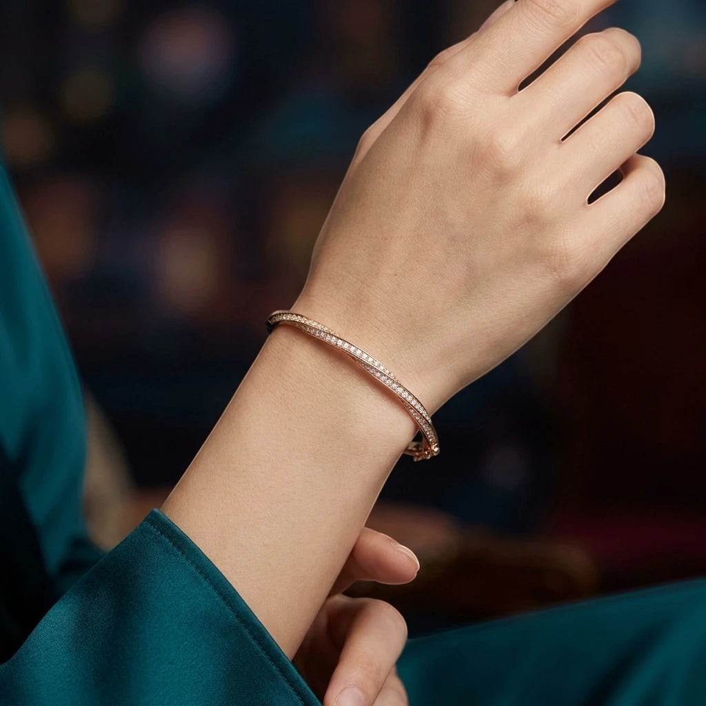 Bee-Bees rose gold twisted bangle bracelet with D VVS1 Moissanite stones, 925 sterling silver with 18K gold plating.