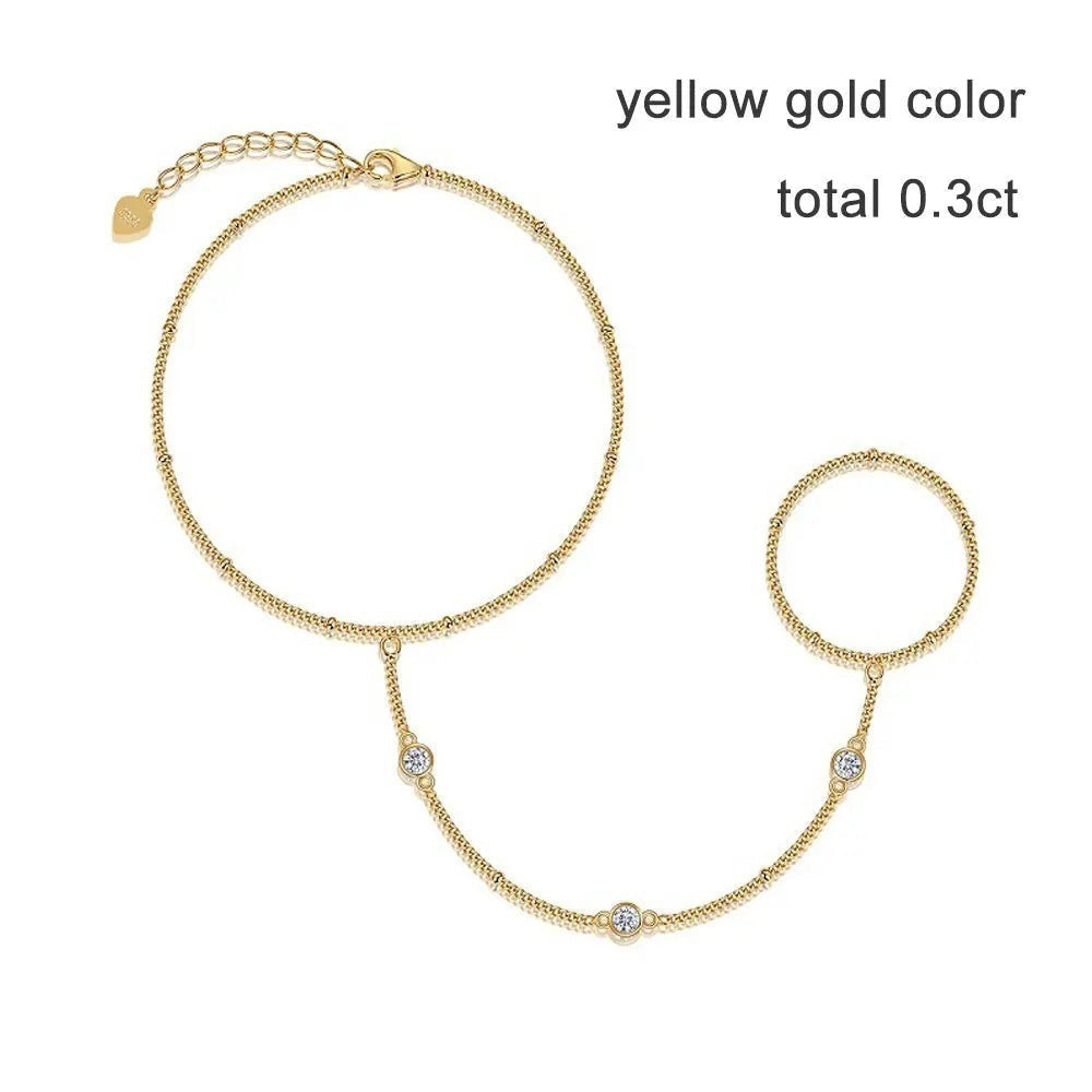 Bee-Bees yellow gold plated 925 silver adjustable bracelet with three 3mm moissanite stones and a connected ring.